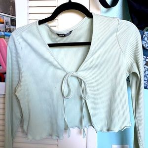 green top with front tie